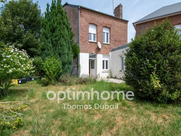 Maison individuelle à rénover avec jardin