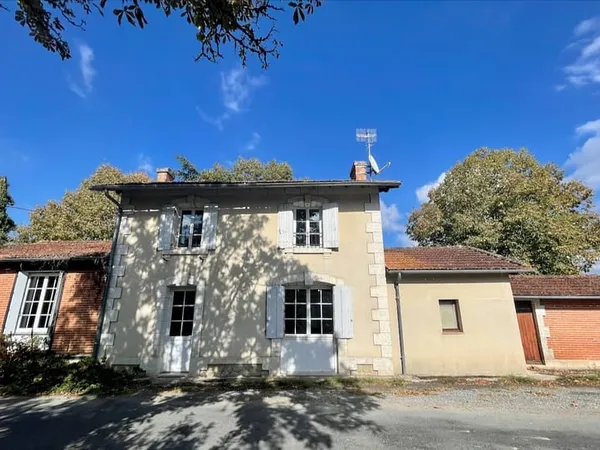 Maison 3 chambres, garage.