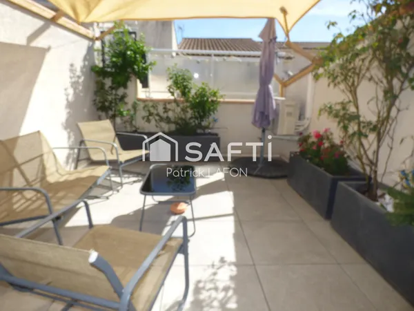 Bel appartement en duplex 2 terrasses et parking.