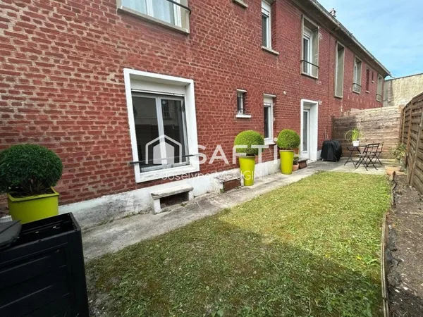 Appartement avec 2 chambres, un extérieur et une cave, secteur faubourg de Hem.