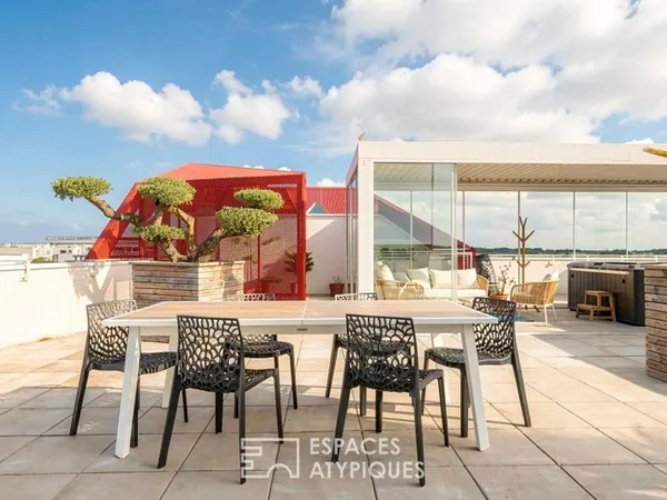 Prendre de la hauteur : appartement contemporain et son rooftop suspendu
