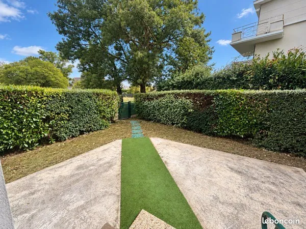 Appartement avec jardin et place de parking