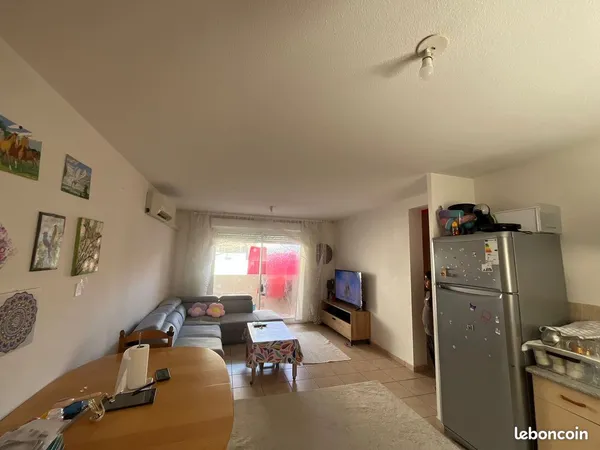 Appartement 2 chambres avec balcon et 2 emplacements de parking