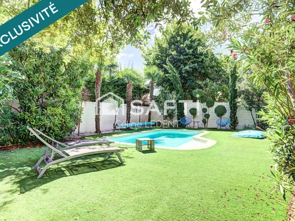 Maison de caractère haut de gamme de plus de 200m2 habitables avec jardin paysager et piscine chauff