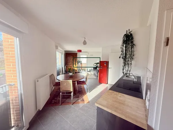 Appartement T3 traversant balcon