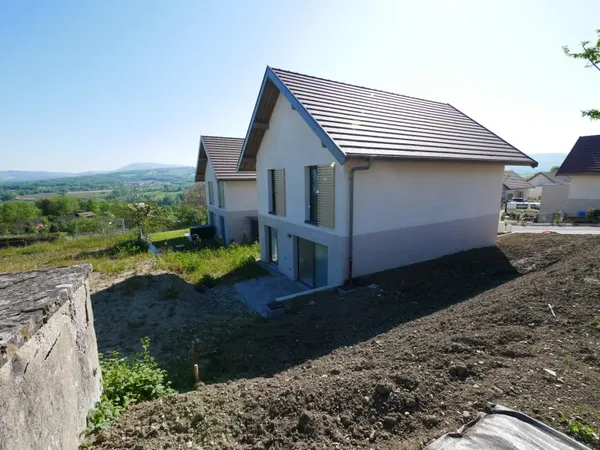 Ensemble résidentiel au coeur du village de MESIGNY à la sortie de la Balme de Sillingy - Découvrez 