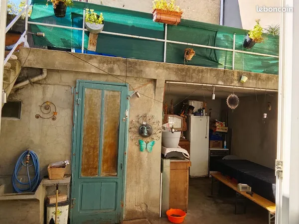 Maison avec cour et garage