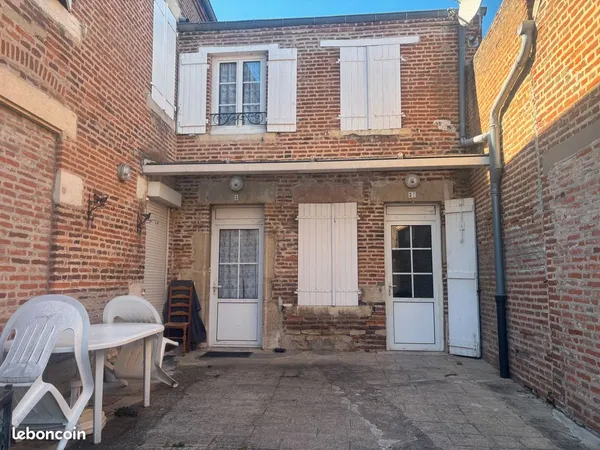 Joli T 2 en centre de village