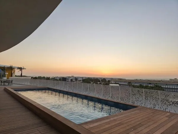 INVESTISSEMENT DUPLEX DE LUXE 87,5 m² au Coeur du Village Naturiste : Prestations Hôtelières (Piscin