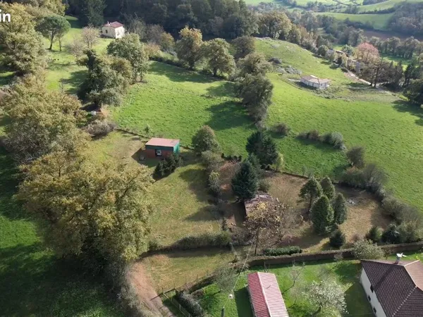 Terrain constructible 1600m² avec Hangar