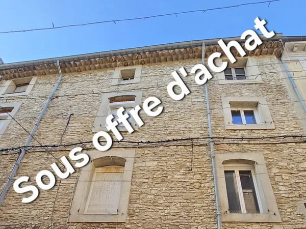 Immeuble de rapport avec local commercial et appartements