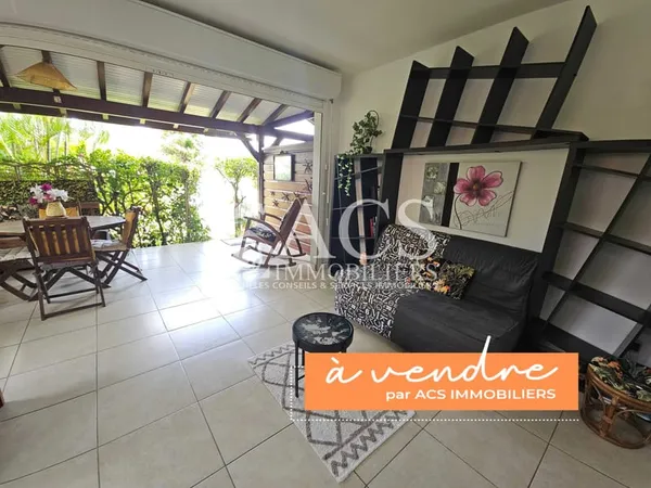 F2 avec grande terrasse et garage fermé dans résidence avec
