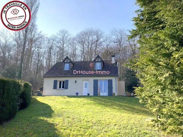 Maison de 4 chambres dans parc boisé