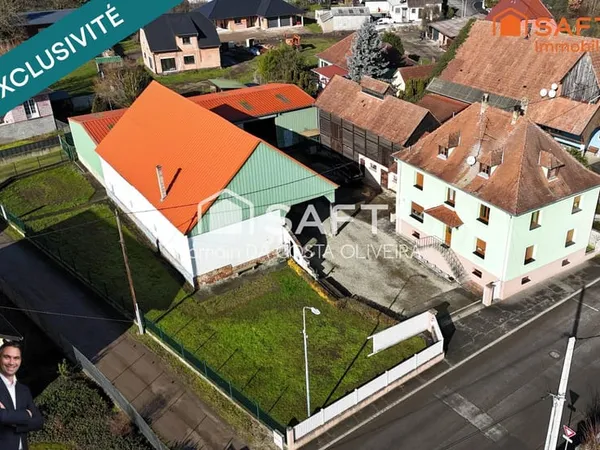 Superbe ensemble immobilier composé d'une maison d'habitation et de 3 dépendances, le tout est impla