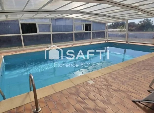 Coup de coeur assuré - Maison familiale de 234 m² avec piscine - Prestations rares - À 8 min de Bell