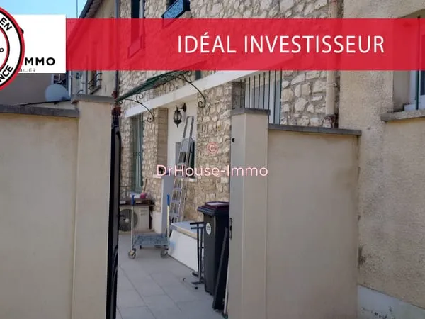 IMMEUBLE DINVESTISSEMENT CENTRE-VILLE DE CHAMPAGNE-SUR-SEINE Rentabilité attractive : entre 8 % et 1
