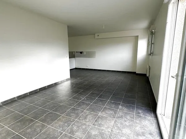 T4 de plain pied avec balcon, dans une petite copropriété -
