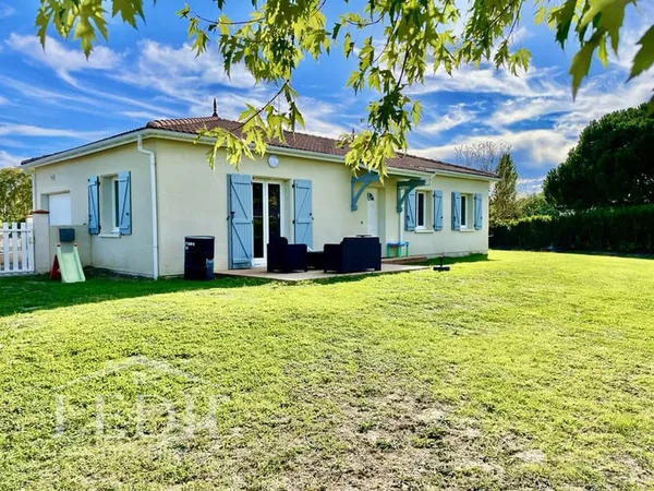 Maison de plain-pied avec garage - terrain 1000m²