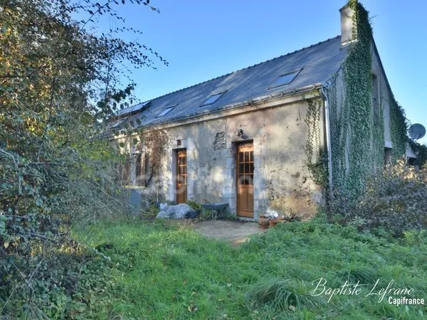 À 2 minutes de Baugé, découvrez cette longère de 150 m² pleine de caractère et de potentiel !