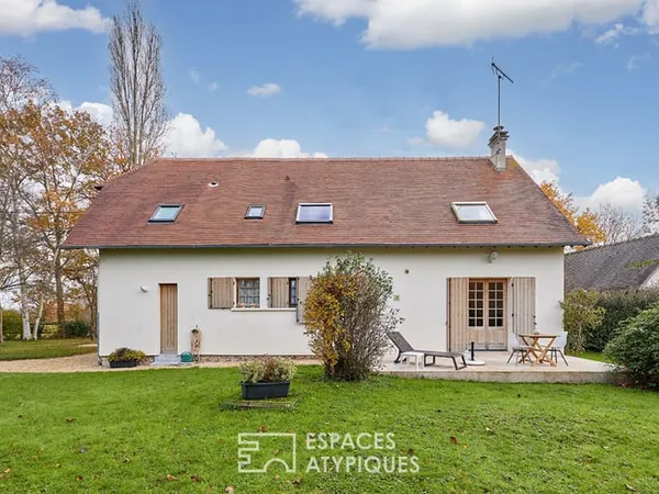 Maison de famille et volumes singuliers au sein d'une impasse