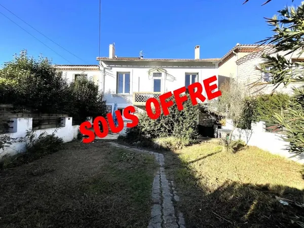 Maison avec grand garage