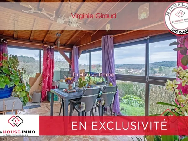 Charmante Maison dans un écrin de verdure avec grand terrain, garage et terrasse