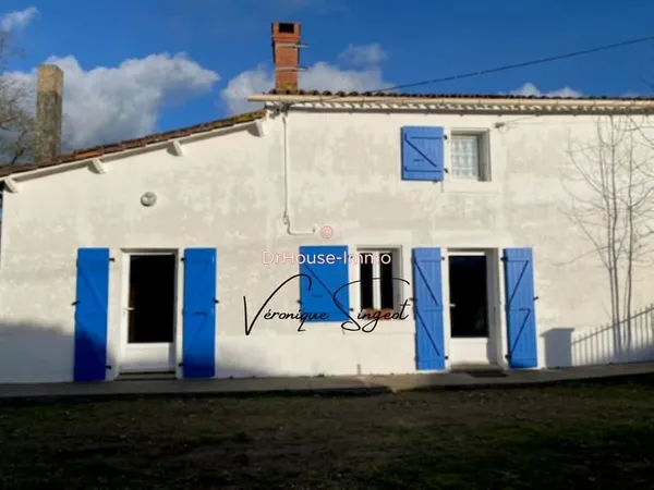 Maison pierre et extension parpaings de 97 m2 sur un terrain de 1200 m2 avec dépendance à rénover