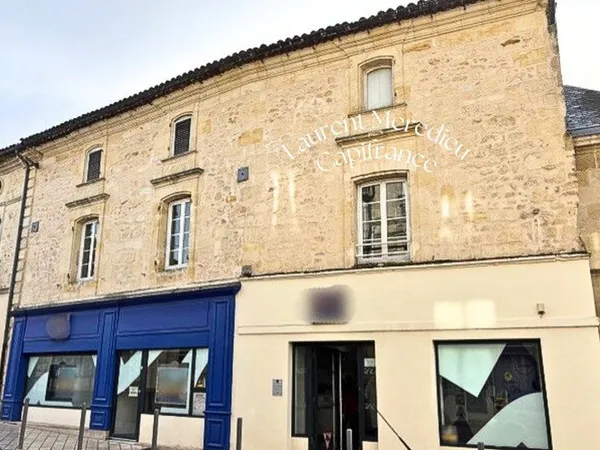 Immeuble de caractère en pierre - Investissement sécurisé avec bail commercial
