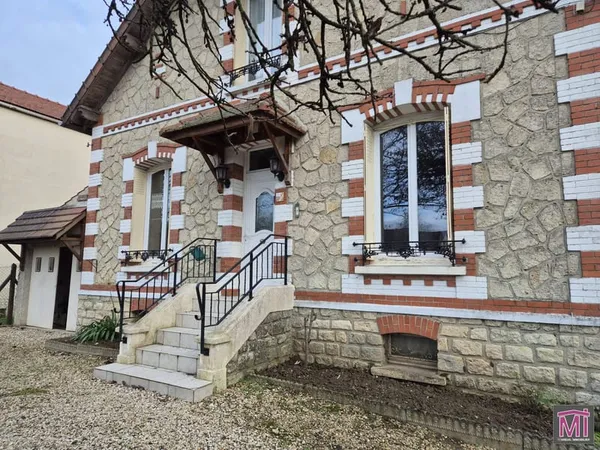 Maison 4 chambres vivable de plain-pied avec garage 
