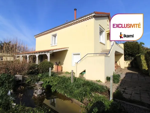 Maison individuelle de 80 m2 avec jardin et garages 