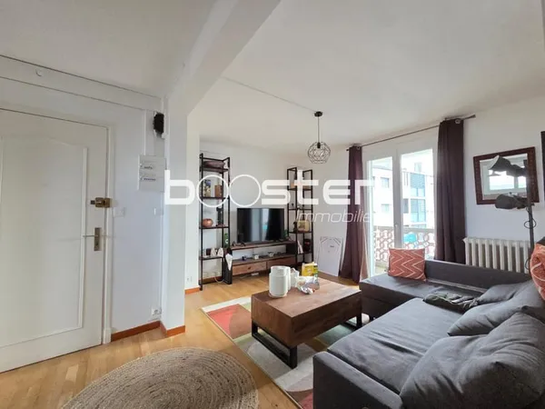 Appartement 3 Pièces Traversant avec Balcons et Cave - Guilhemery 