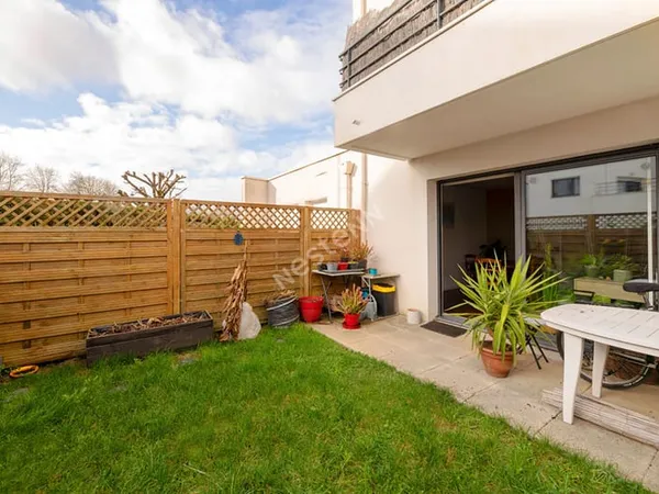 Appartement T3 de plein pied avec jardin à vendre à Domloup 70 m² Centre à pied Parking & garage fer