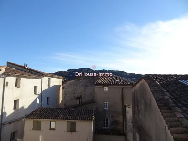 Immeuble de 2 appartements à Anduze et un local commercial, Idéal pour Investisseurs