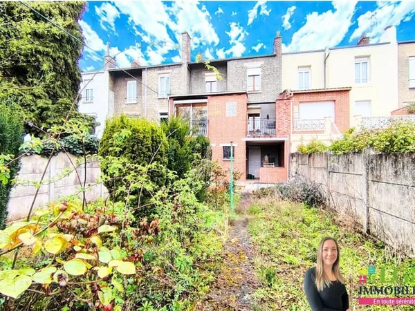 Maison avec fort potentiel, sous-sol complet et jardin - secteur Dampierre