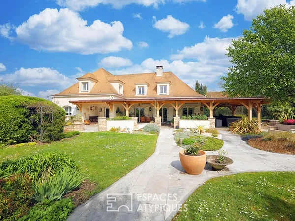La maison contemporaine avec espace bien être et jardin paysagé
