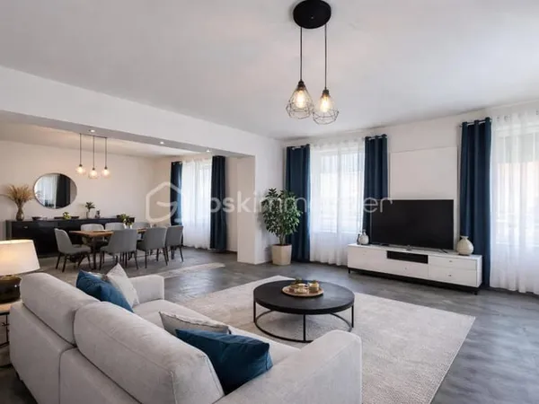 Duplex 110 m² - 2 chambres + 1 bureau - Jardin, cave et stationnement - Faibles charges