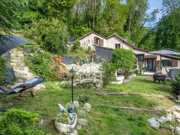 Maison de 128 m² - 3 chambres avec jardin boisé