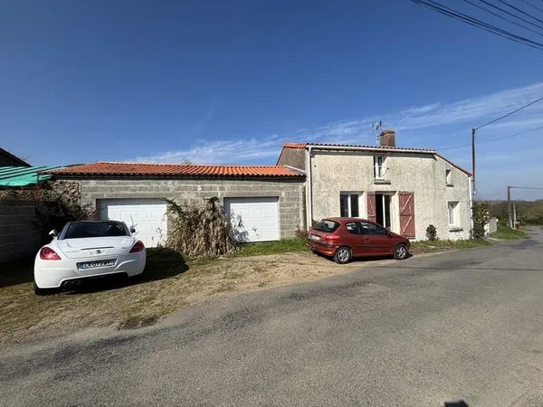 Maison ancienne en village à Oudon