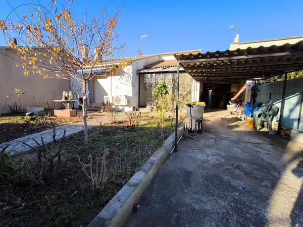 Maison 77M2 2 chambres et 1 bureau sur un terrain de 334M2 