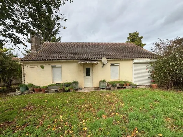 Monsempron: Maison De Plain-Pied Avec Garage Et Caves Sur 514 M² De Terrain 