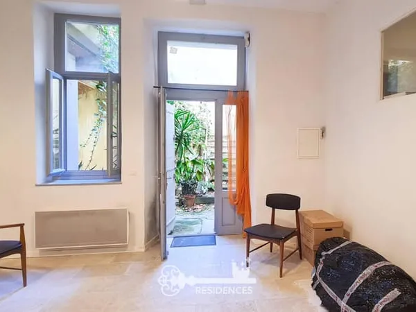 Appartement de type 2 en rez-de-chaussée d'un immeuble du centre historique d'Uzès 