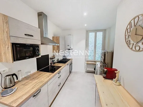 Appartement 1er étage, centre-ville, avec garage et cave 