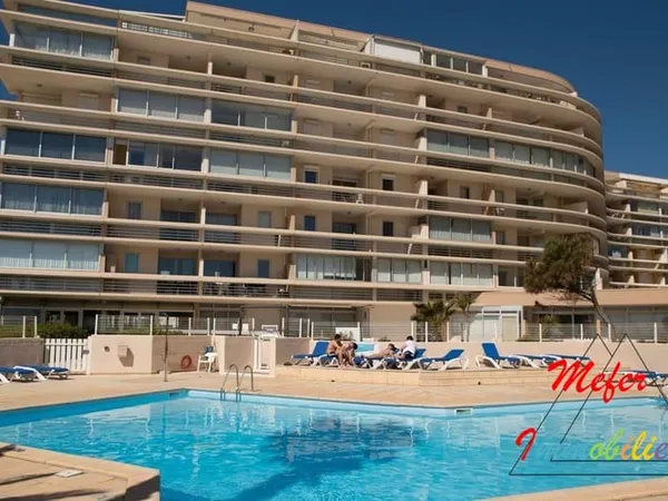 Appartement 2 pièces loué dans résidence avec piscine