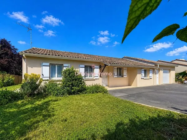 Maison de plain-pied 4 chambres avec jardin clos