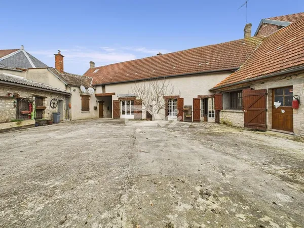 Magnifique corps de ferme en pierre datant de 1789 avec nombreuses dépendances