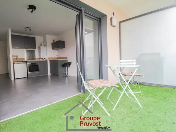 T2 centre-ville avec balcon + double garage 