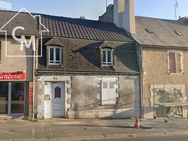 maison mitoyenne sur deux niveaux avec cour