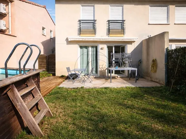Maison R+1 90 m2 avec garage et place de parking privative 