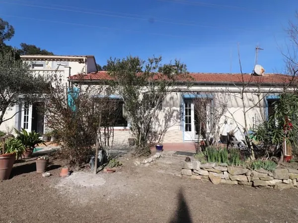 Maison de plain-pied 3/4 P de 106 m2 sur terrain de 1 612 m2