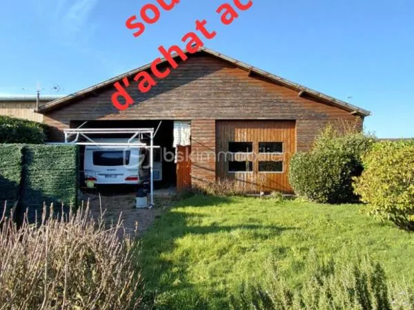 BEAU TERRAIN AVEC BATIMENT